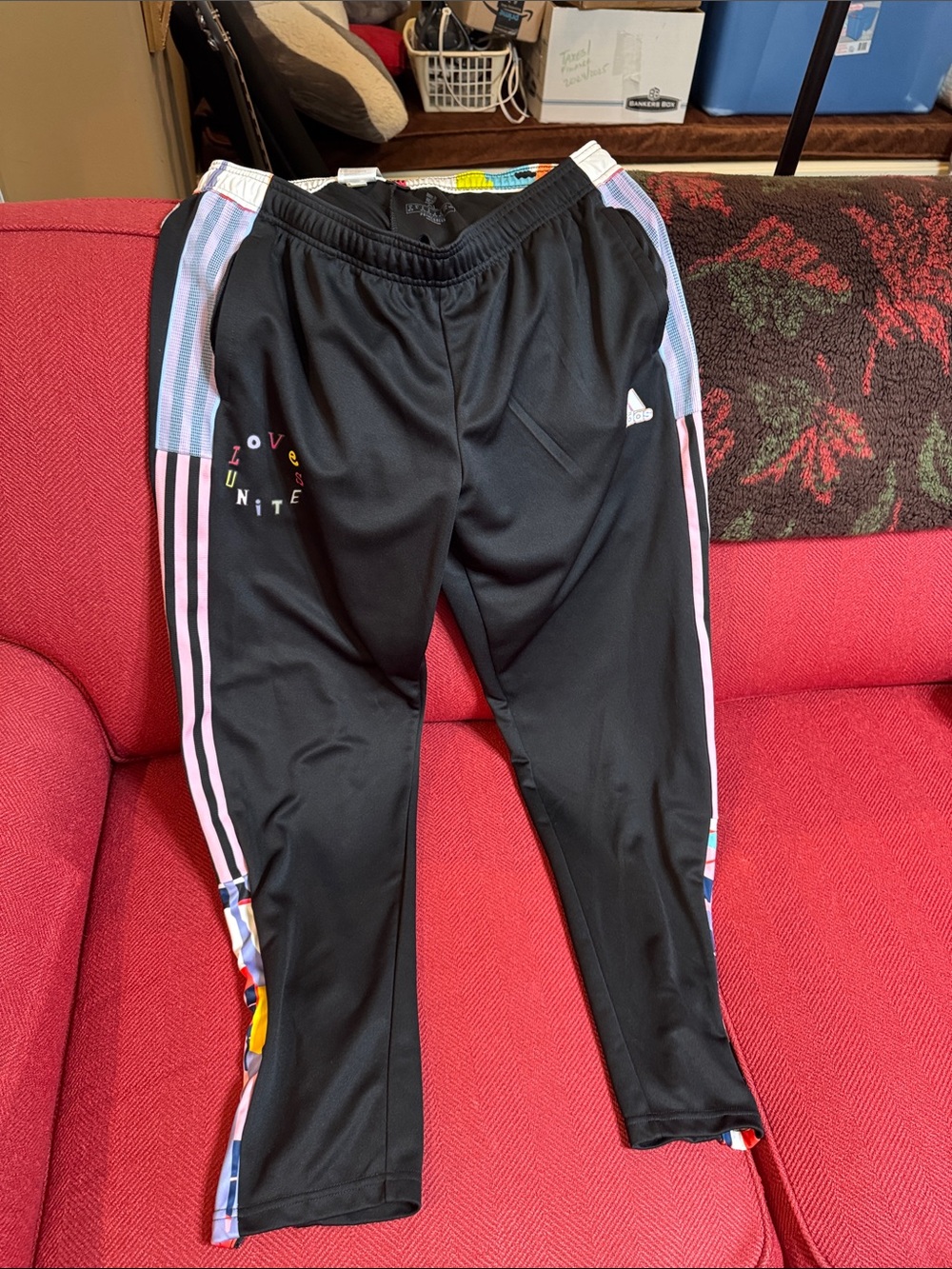 adidas Black “Love Unites” Joggers with Pink and Multicolor Stripe Details